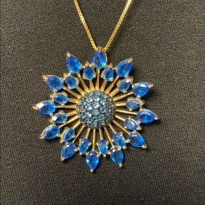 Cubic zirconia blue starburst pendant and chain